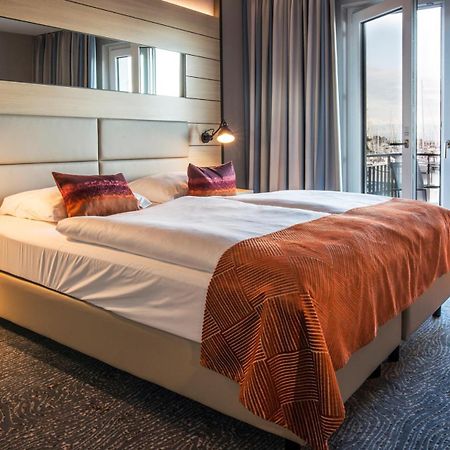 Hafenhotel Meereszeiten Гайлігенгафен Екстер'єр фото